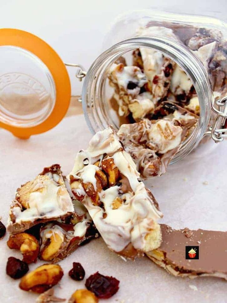 Irish Cream Chocolate Bark 2 Irish Cream Chocolate Bark! A delicious chocolate treat loaded with cranberries, cookies and honey spiced nuts. Perfect for the holidays and great for gifts.