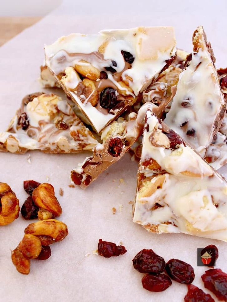 Irish Cream Chocolate Bark 4 Irish Cream Chocolate Bark! A delicious chocolate treat loaded with cranberries, cookies and honey spiced nuts. Perfect for the holidays and great for gifts.