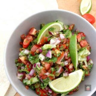 Best Ever Pico De Gallo, Salsa Fresca, a delicious Mexican salsa, quick and easy to make with refreshing flavors of lime, jalapenos, tomatoes, and cilantro. Absolutely delicious!