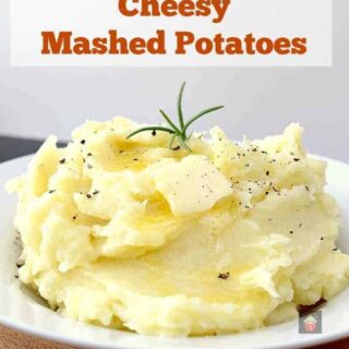 Creamy Cheesy Mashed Potatoes is a very easy side dish with amazing flavor. Make ahead, freezer friendly and great for a weeknight dinner or Thanksgiving too!