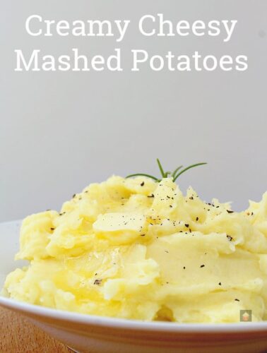 Creamy Cheesy Mashed Potatoes is a very easy side dish with amazing flavor. Make ahead, freezer friendly and great for a weeknight dinner or Thanksgiving too!