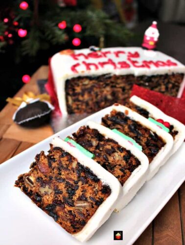 Cranberry and Pecan Christmas Cake, loaded with delicious fruits and Spiced Rum. A perfect treat for Christmas.