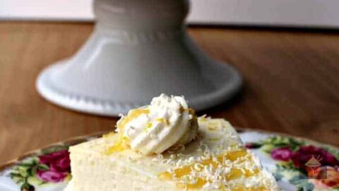 Fluffy Lemon Ricotta Cheesecake is a lovely baked dessert and so light and airy. Perfect for Easter, Mother's Day or any time of the year! It's out of this world delicious!