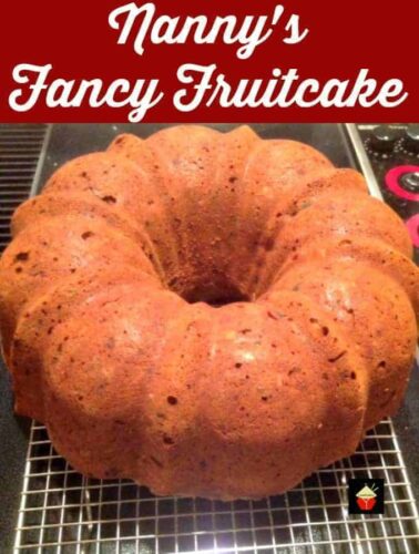 Nanny's Fancy Fruitcake is a keeper cake recipe, easy and delicious, perfect for the holidays. Made using a cake box mix, pecans, raisins and candied peel.