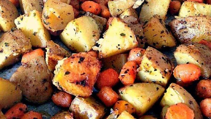 Spiced - Oven Baked Potatoes & Baby Carrots. A popular family recipe and very flexible with the flavors and ingredients. An easy sheet pan side dish