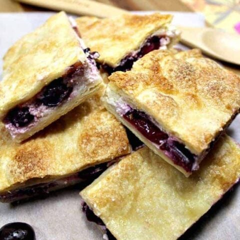 Cherry Cream Cheese Crescent Roll Bars 11 Cherry Crescent Roll Cheesecake Bars. A.K.A Sopapilla Cheesecake Bars. An incredibly quick, easy recipe with cream cheese and cherries sandwiched between layers of flaky buttery golden pastry. Popular cream cheese crescent roll dessert