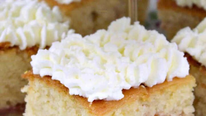 Lemon Drizzle Raspberry Ripple Cake. Easy recipe, soft, moist and great tasting cake, bursting with lemon and raspberry. A perfect sweet treat for afternoon tea or dessert.