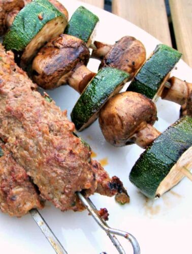 Zucchini and Mushroom Kebabs. A perfect side dish to any BBQ, easy to make with a simple balsamic marinade. Full of flavor, juicy vegetables on a kebab