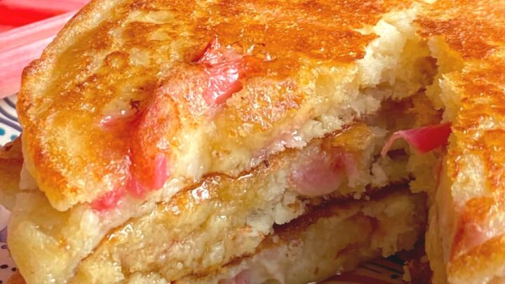 Fluffy Rhubarb Pancakes. Quick and easy breakfast pancakes, bursting with juicy rhubarb. Light and as fluffy as a feather, with no added fat. Serve warm with a drizzle of maple syrup or honey.