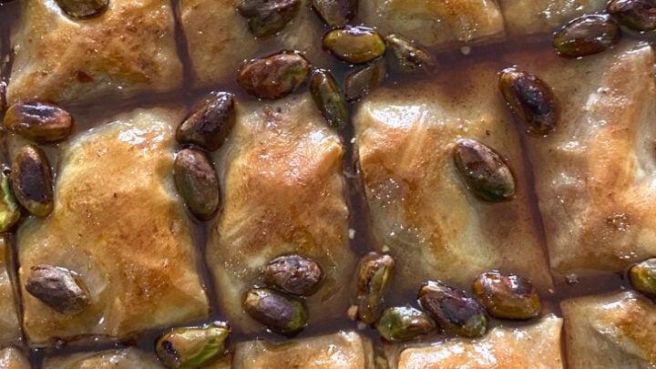 Easy Honey Baklava. Baklava is a Middle Eastern classic sweet treat, filled with a variety of nuts, honey, citrus, and spices, between layers of crunchy phyllo pastry. Ideal for serving at parties, or to have as a snack. An easy and simple recipe for the best baklava!
