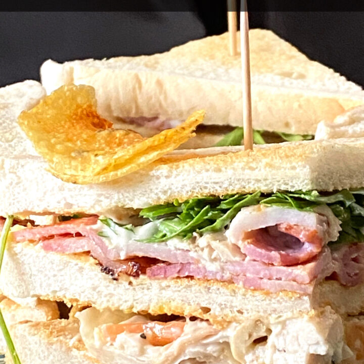 Classic Club Sandwich 8 Hotel Style Club Sandwiches, toasted layers of bread filled with bacon, chicken, lettuce and tomato. A delicious classic sandwich recipe, perfect for brunch or lunch