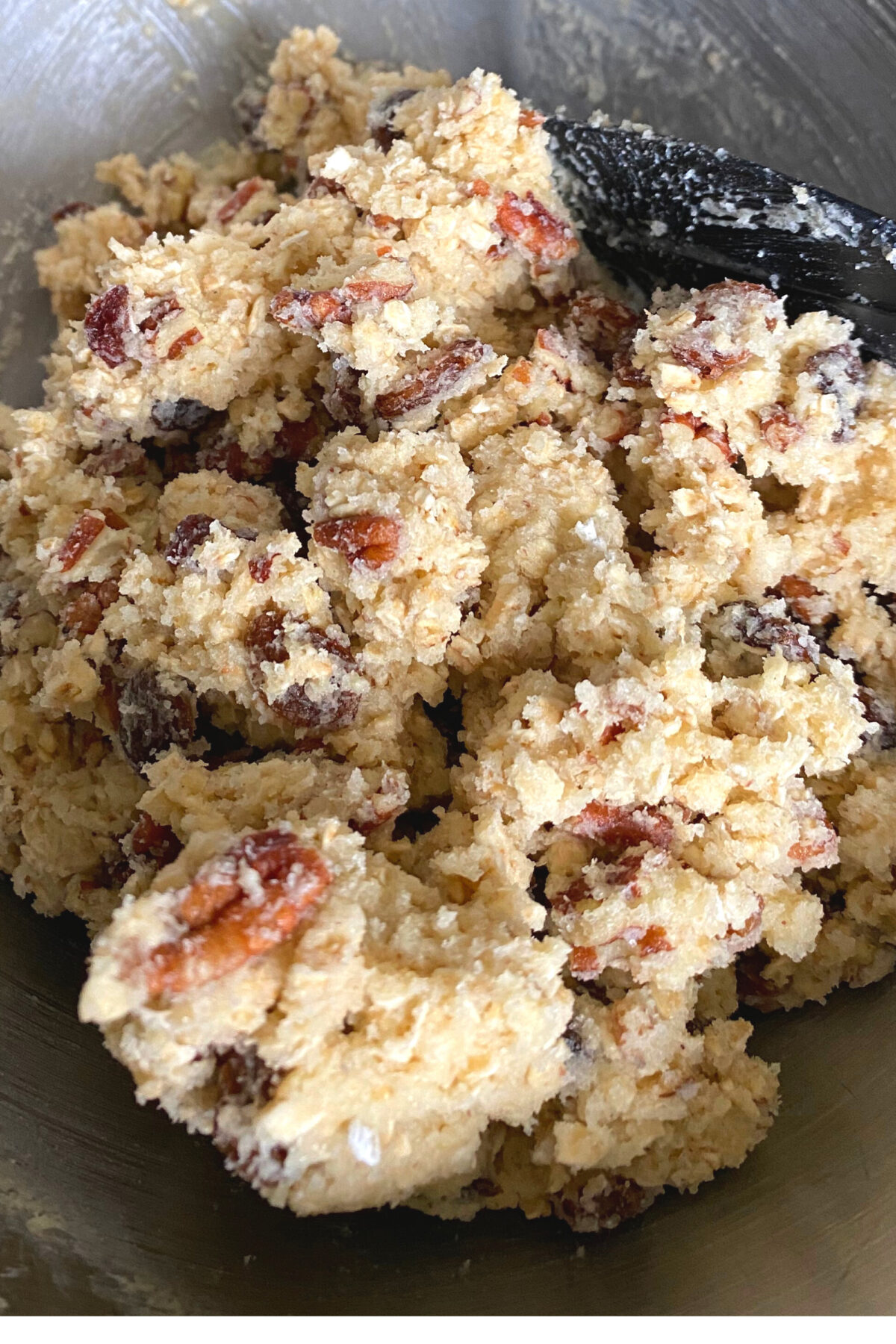 Pecan and Raisin Oatmeal Cookies, cookie dough batter combined Pecan and Raisin Oatmeal Cookies, cookie dough batter combined