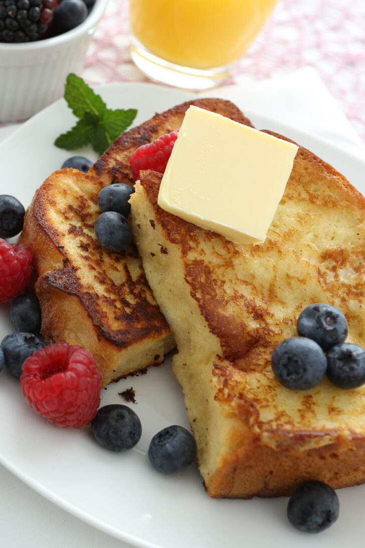French Toast, A.K.A 'Eggy Bread" is soft bread, soaked in beaten egg and pan-fried in butter. Serve for breakfast or brunch with a selection of berries and a drizzle of honey