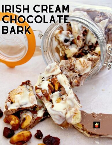 Irish Cream Chocolate Bark! A delicious chocolate treat loaded with cranberries, cookies and honey spiced nuts. Perfect for the holidays and great for gifts.