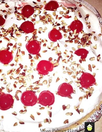 Mom's Banana Split Pie is a delicious no-bake vintage pie recipe, made up of cherries, bananas, cream, pineapple & nuts, set in a graham cracker pie crust. A family favorite!
