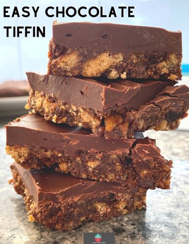 Easy Chocolate Tiffin is a delicious no-bake British colonial recipe, made of chocolate, crushed cookies, syrup, and raisins, often served at English afternoon tea.