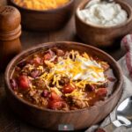 Easy Chili Con Carne. This classic chili con carne is packed with flavor. Using pantry ingredients, this spicy beef stew is great for parties, easy dinners and freezes well too. Easy recipe.