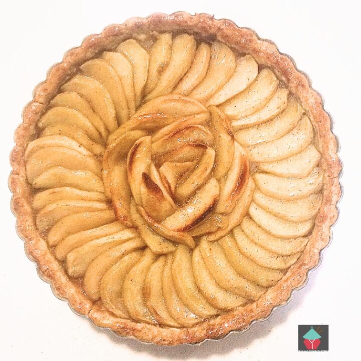 French Apple Tart, a delicious sweet, crumbly pastry tart with slices of apple sitting on a crisp pastry base. Ideal for dessert or to have with tea.