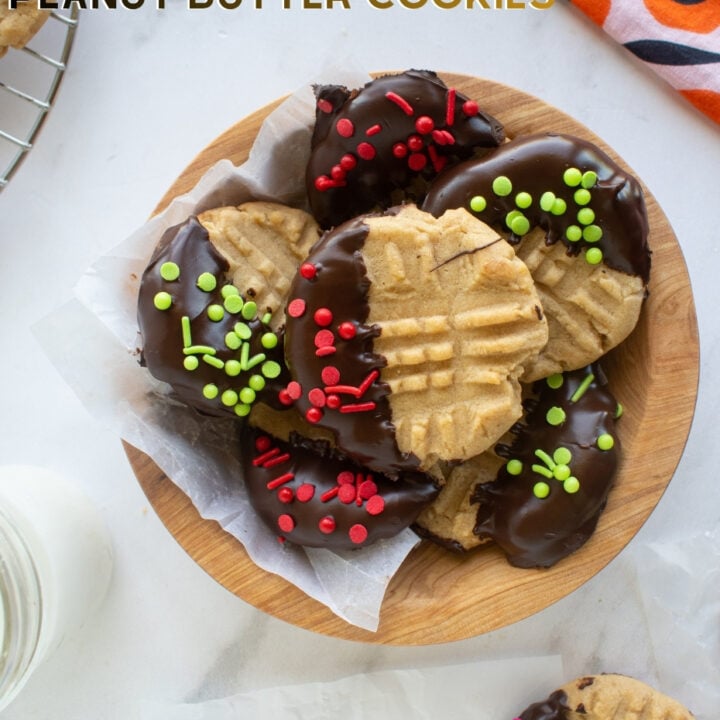 Chocolate Dipped Peanut Butter Cookies Chocolate Dipped Peanut Butter Cookies Classic peanut butter cookies dipped in chocolate and covered in sprinkles are delicious with a cold glass of milk. Creamy, crunchy and full of flavor. Easy recipe too!