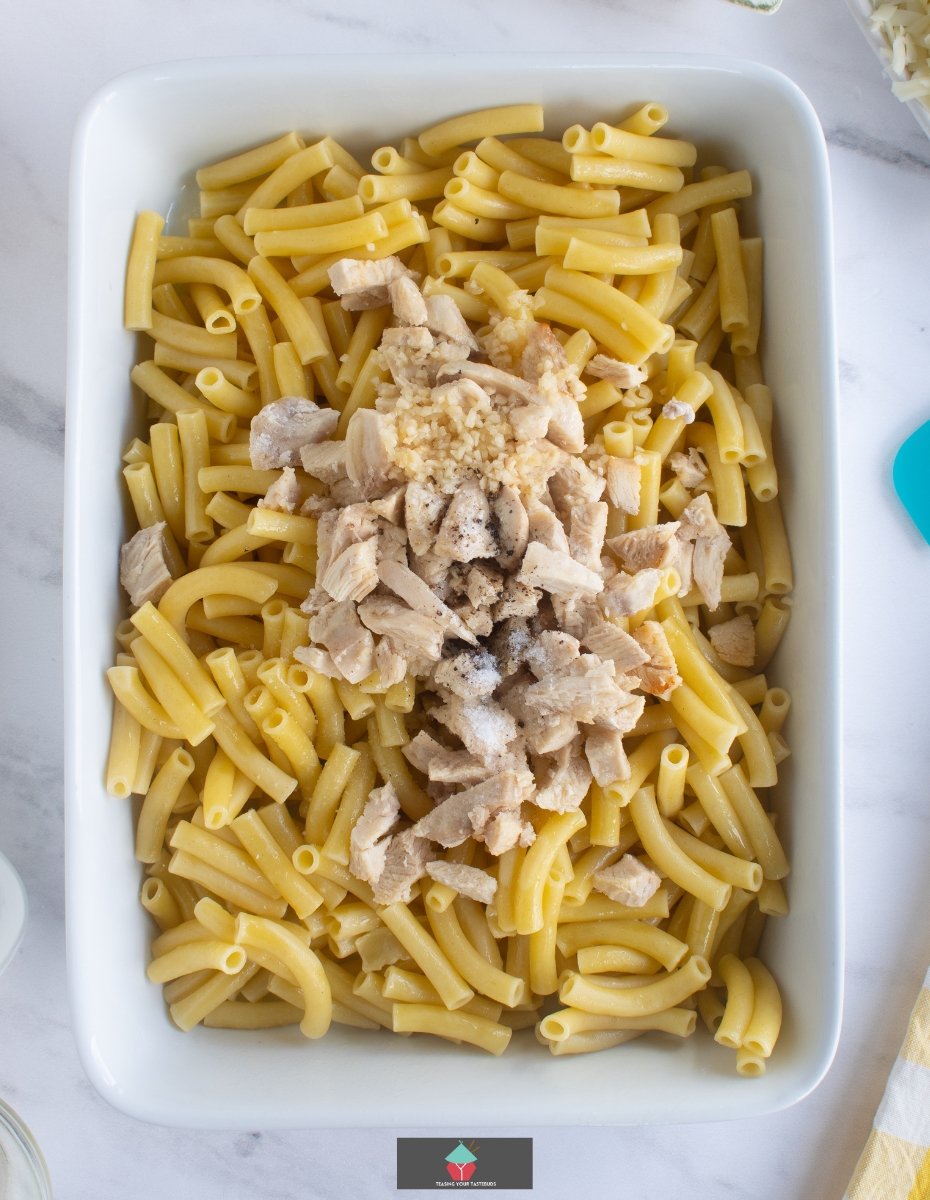 Chicken Alfredo Ziti Pasta Bake, adding chicken and seasonings Chicken Alfredo Ziti Pasta Bake, adding chicken and seasonings