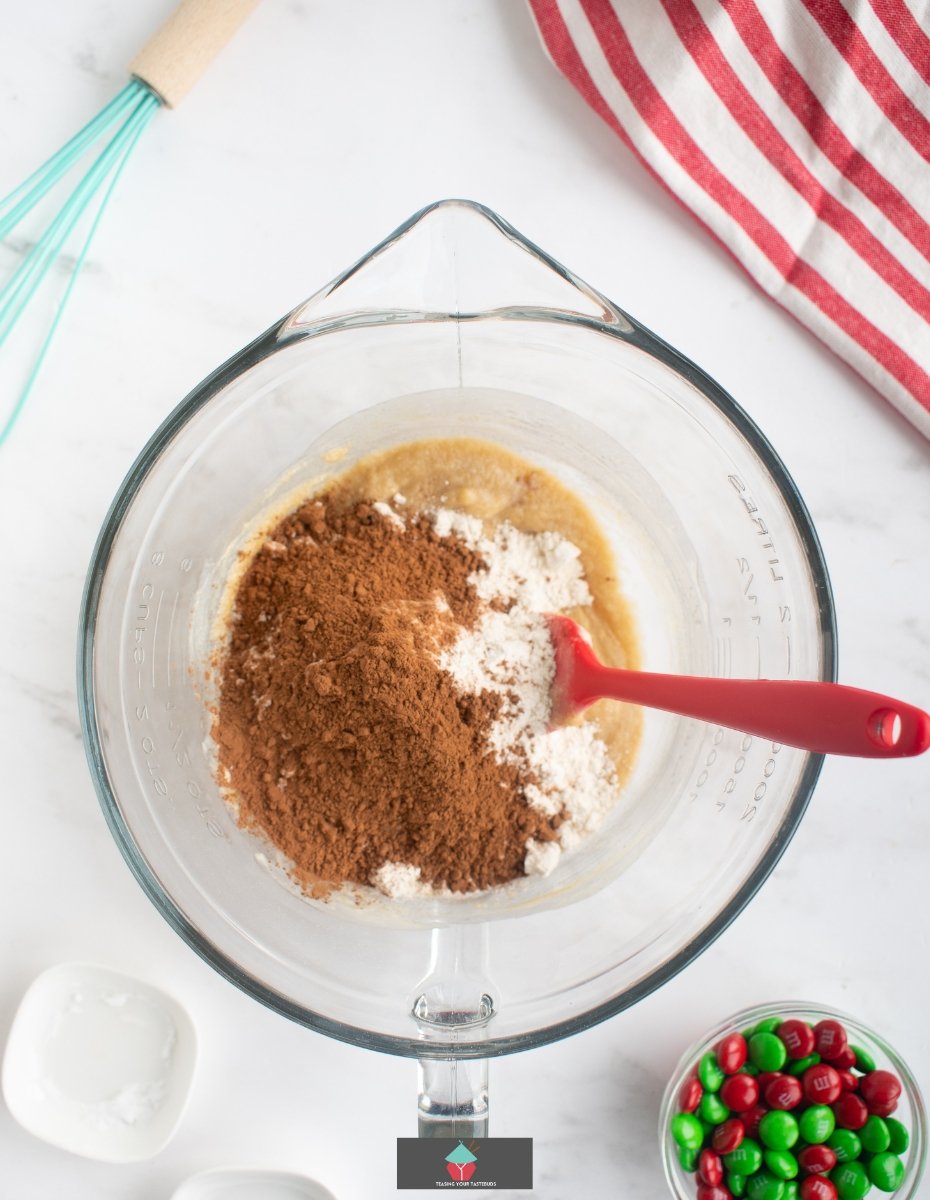 Crispy Chocolate M&M Cookies, adding dry ingredients to mixture Crispy Chocolate M&M Cookies, adding dry ingredients to mixture