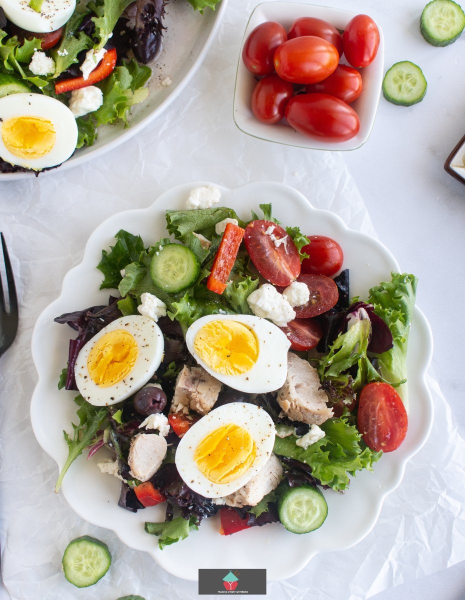 Greek Chicken Salad Greek Chicken Salad is full of flavor, tender juicy chicken breasts, combined with a variety of salads, olives, and feta cheese, with a generous coating of delicious Greek salad dressing. Easy to make and a very popular salad recipe.